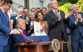 Trump Signing the Bill
