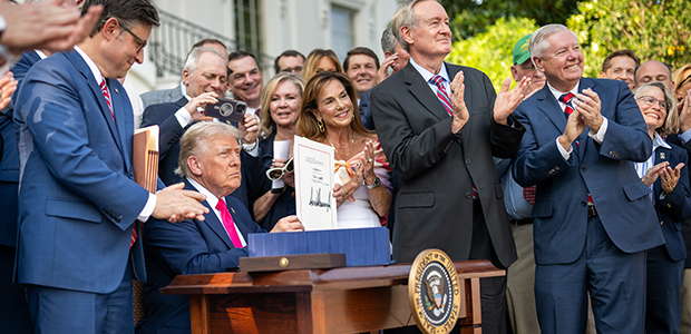Trump Signing the Bill