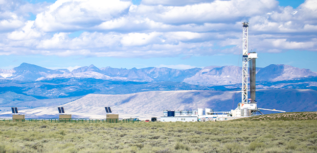 drilling rig and mountains